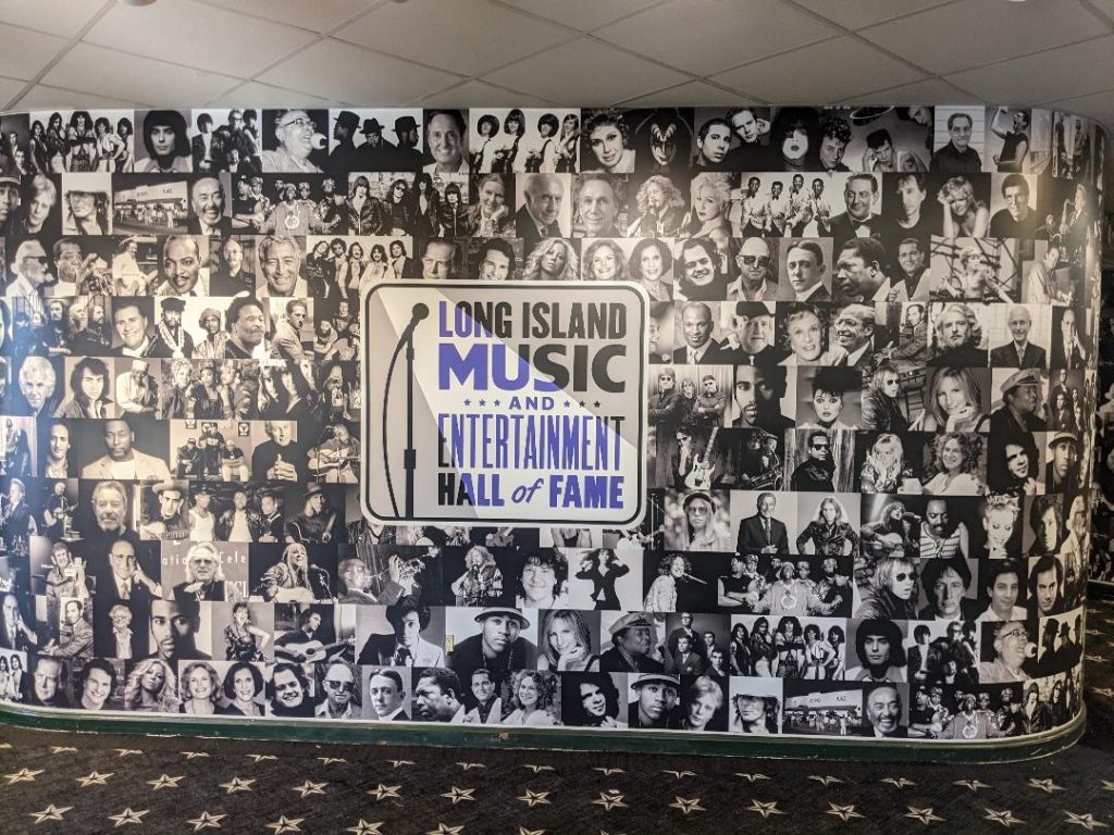 The Long Island Music and Entertainment Hall of Fame wall features photos of Long Island  artists and music enthusiasts (Courtesy of Jeffrey James)