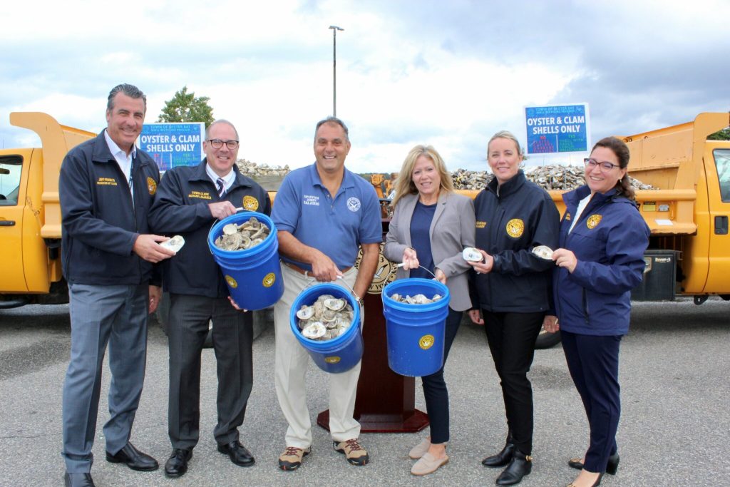 Oyster Bay Town officials show a few shells collected from the Oyster Bay festival that will to be recycled back into the waterways. (Photo: Town of Oyster Bay)