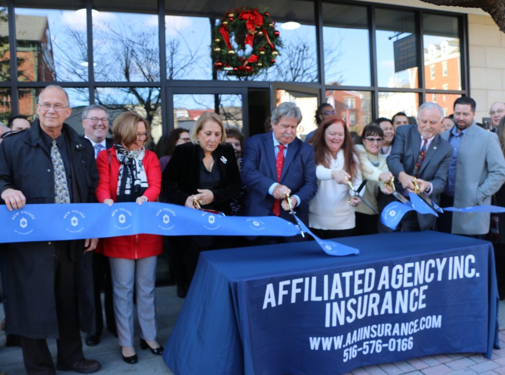 Photo by Hank Russell
Standing behind the table to take part in the ribbon cutting for Affiliated Agency, Inc. include (left to right) Vice Presidents Kathryn Capo and Thomas J. Duggan, General Manager Ellen Gaug and President Phil Muller.