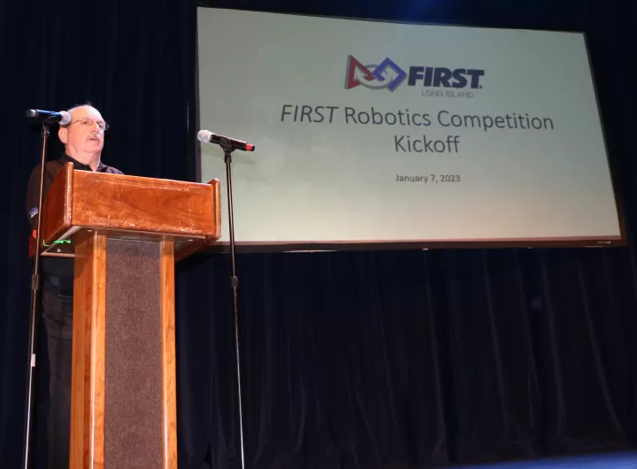 FIRST Long Island FRC Regional Director Larry Toonkel speaks during the FRC Kickoff at LIU Post’s Krasnoff Theater on January 7.