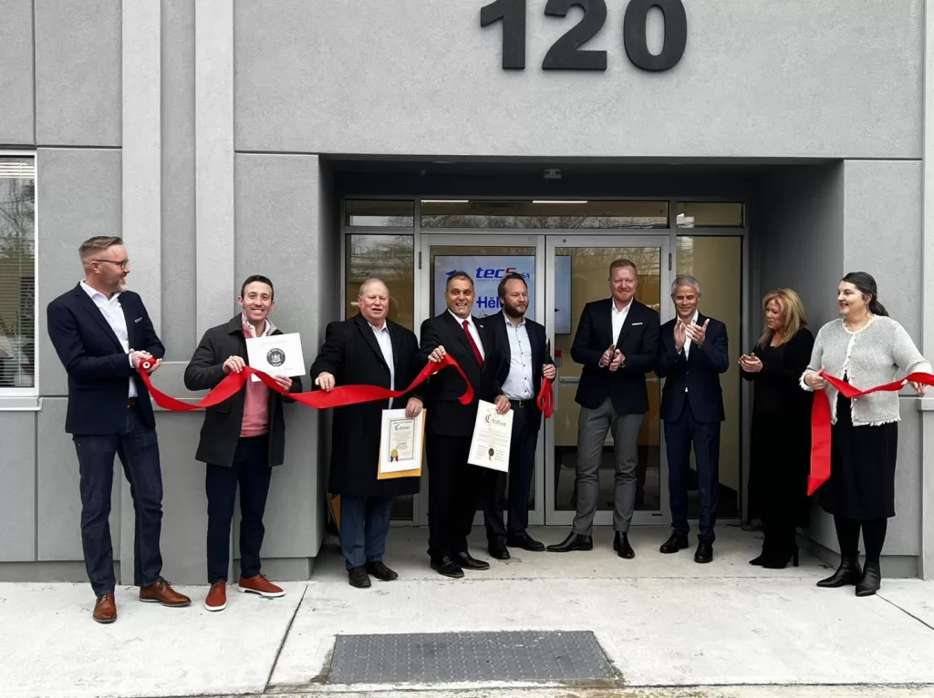 (Photo: Office of Legislator Arnold W. Drucker) Nassau County Legislator Arnold W. Drucker (third from left) joins other elected officials and members of tec5USA at the company's grand opening in Plainview on January 19.