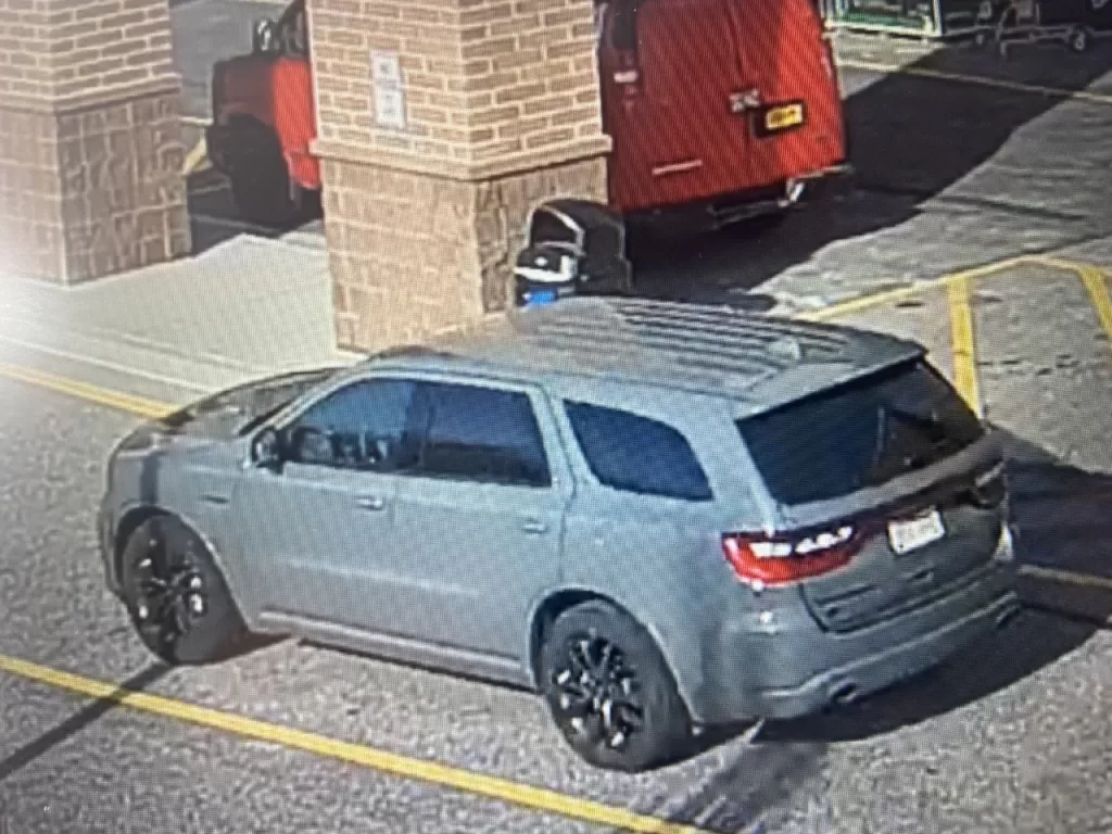 (Photo Courtesy of SCPD) Two men left in this grey Dodge SUV after stealing $2,900 in merchandise at a Lowe's store in Commack.