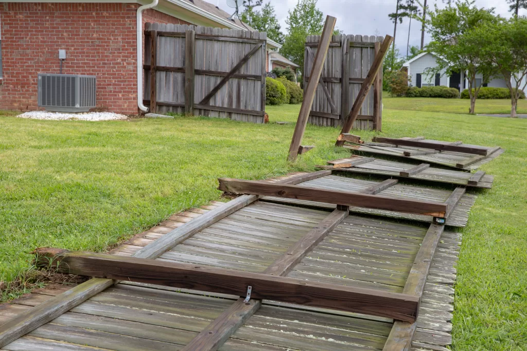 Wood fence blown over during severe storm and tornado