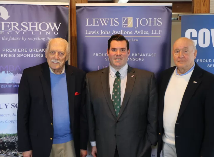 (Photo by Hank Russell) IgniteLI Executive Director Patrick Boyle (center) is joined by LIMBA (Long Island Metro Business Action) Chairman Ernie Fazio (left) and Board Member Ken Nevor (right) at the LIMBA meeting at the Candlelight Diner in Commack on March 3.