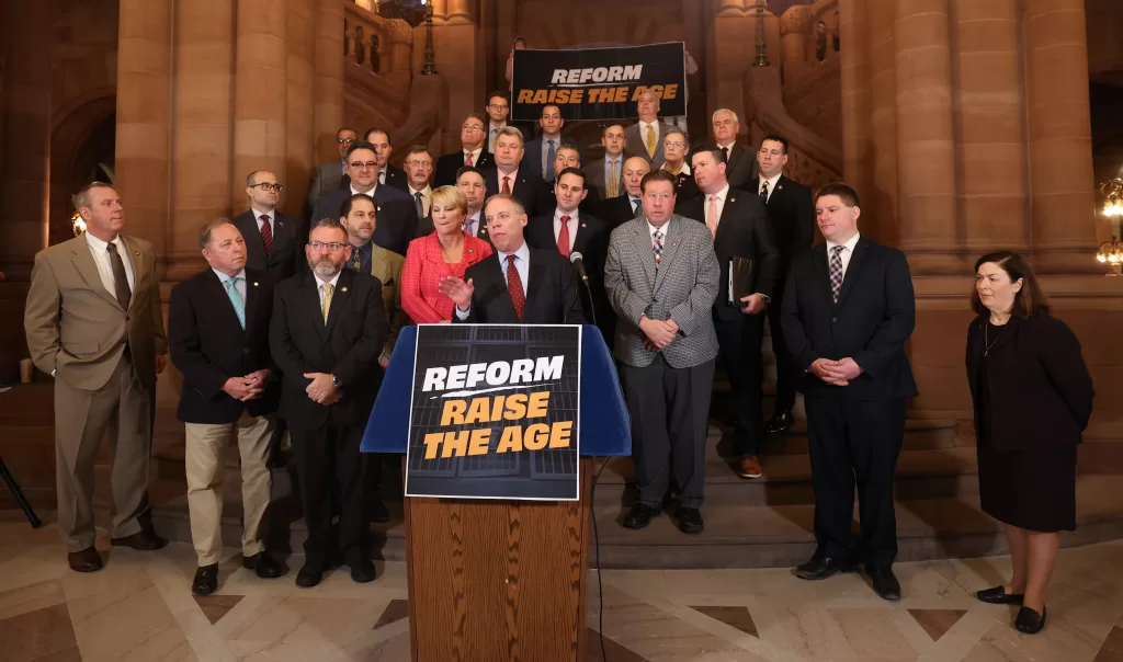 (Photo: Office of NYS Assembly Minority Leader Michael Barclay) New York State Assembly Minority Leader Will Barclay is joined by fellow members of the Assembly Minority Conference to call for reforms to the "Raise The Age" law on March 23.