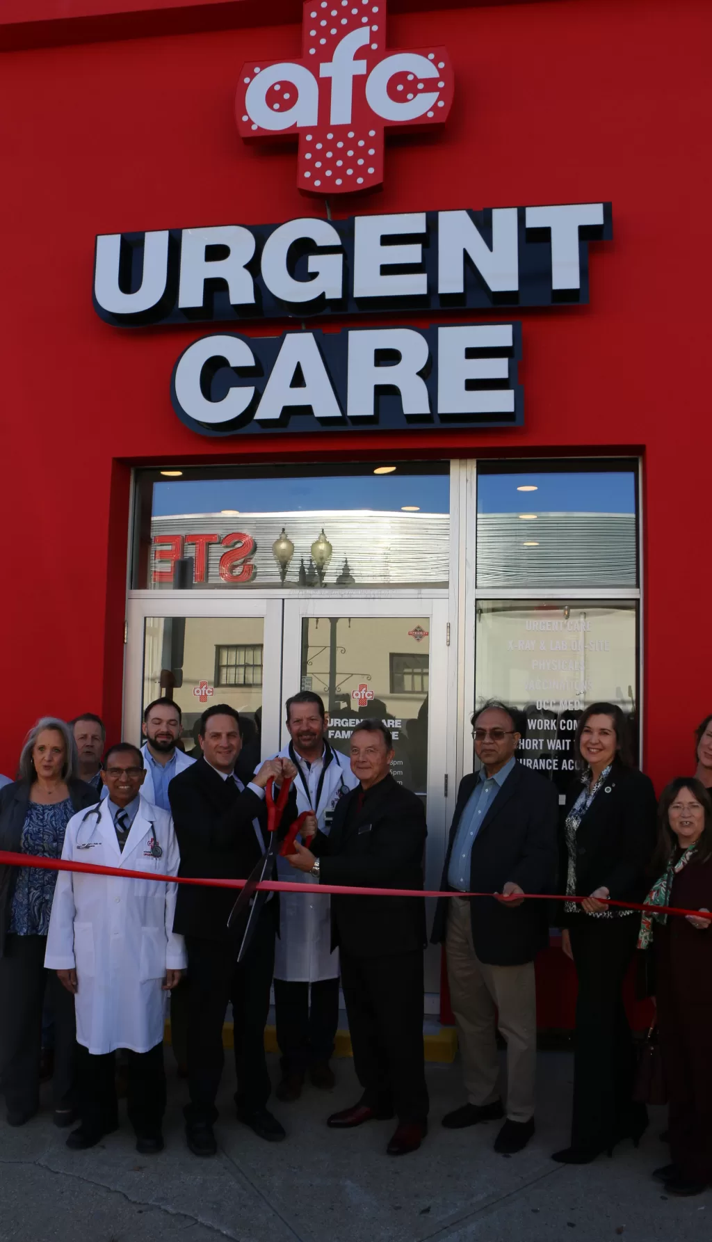 (Photo by Hank Russell) Pictured (front row, left to right): Penny Hines, chief of staff for New York State Senator Dean Murray, Dr. Mohammed A. Mojid, Business Manager Justin Schwartz, Managing Director/Co-Owner Lou Dionisio, Dr. Faraque Ahmed, Patchogue Village Trustee Susan Henke-Brinkman and CDA Director Mirian Russo. Back row (l-r): Greater Patchogue Chamber of Commerce Executive Director Dave Kennedy, Physician’s Assistant Mark Szigeti and Dr. Victor Politi.