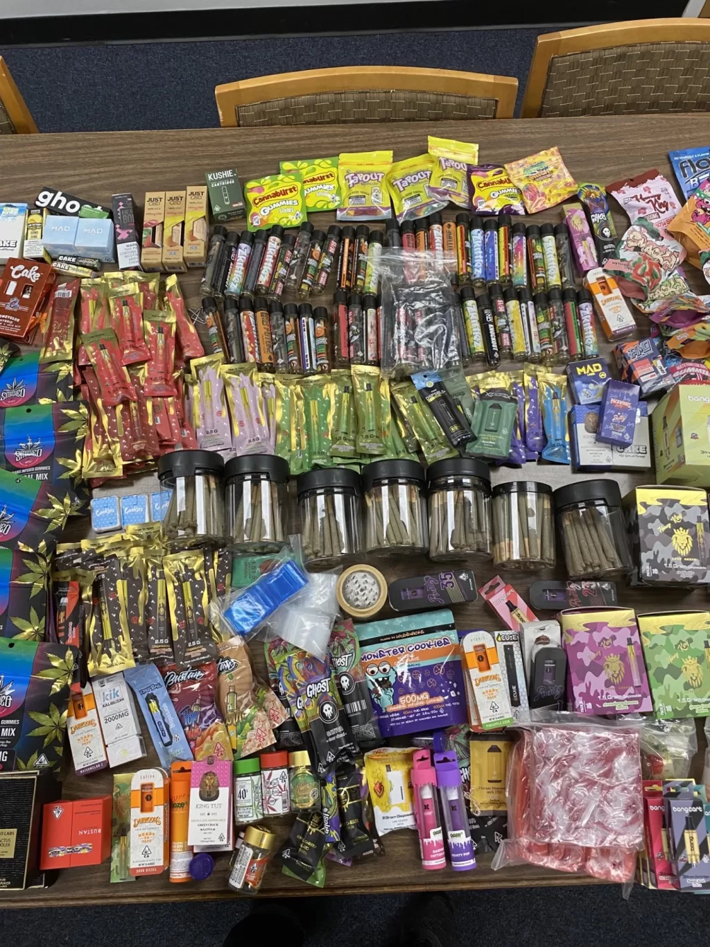 (Photo: Courtesy of Suffolk County Police Department) Police seized large quantities of cannabis, concentrated cannabis, cannabis packing equipment, and flavored vape products from Cloud Smoke Cigar And Convenience in Huntington Station. The store’s two owners were arrested.