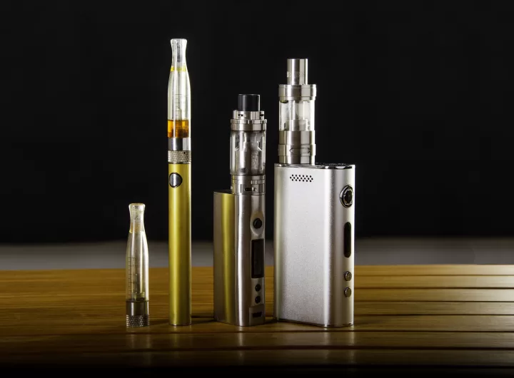 vape devices and electronic cigarette, ecig and mods over a black background.