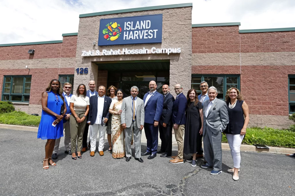 (Photo by Scott Levy) (left to right) Suffolk County DeputyExecutive Vanessa Baird-Streeter, Island Harvest Capital Campaign Committee Co-chair Raymond Farrell, New York State Senator Monica Martinez, Island Harvest Board Members Barry Chandler and Tariq Khan, President & CEO of Island Harvest Randi Shubin Dresner, Rahat and Zaki Hossian, Island Harvest Board Chairman Dan Grinberg, Island Harvest Board Member Stephen Jucham, New York State Assemblyman Edward Ra, Island Harvest Board Member Ellen Sanders. Feeding America Chief Communications & Community Engagement Officer Rajesh Michandani, former Island Harvest Capital Campaign Committee Chair Douglas Manditch, and Island Harvest Board Member Rebecca D’Eloia.