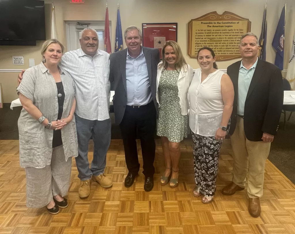 (Photo Courtesy of Huntington Republican Committee) Huntington Town Republican Committee Chairman Tom McNally (third from left) is joined by fellow committee members after being unanimously re-elected for another term. Pictured (left to right): Huntington Town Board Candidate Brooke Lupinacci, Highway Superintendent Andre Sorrentino, Town Board Candidate Theresa Mari, Receiver of Taxes Candidate Pamela Velastegui, and Town Supervisor Ed Smyth.