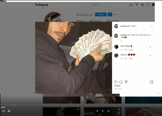 (Photo Courtesy of the Attorney General's Office) One of the offenders posts a picture of himself on social media with some of the money he stole.