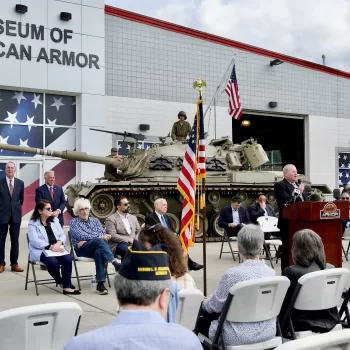 (Photo Courtesy of the Museum of American Armor) Nassau County Legislator Arnold Drucker speaks at a special ceremony commemorating the 50th anniversary of the Yom Kippur War at the Museum of American Armor.