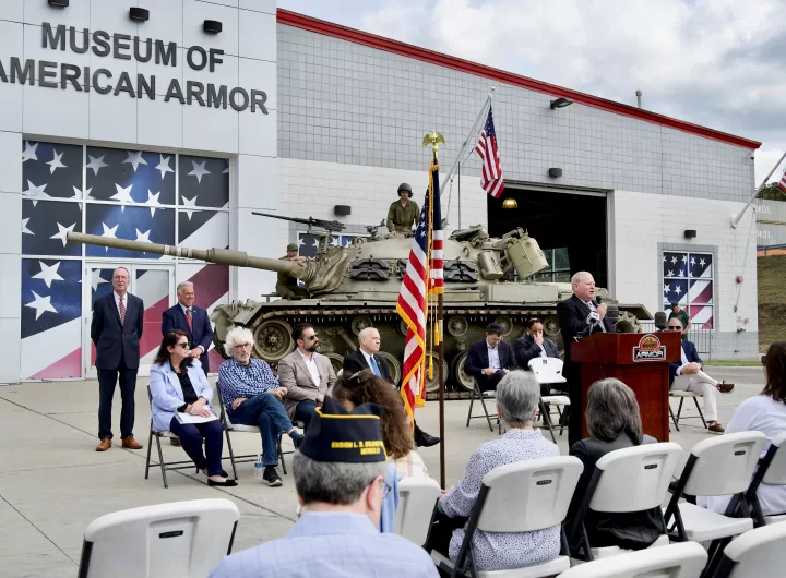 (Photo Courtesy of the Museum of American Armor) Nassau County Legislator Arnold Drucker speaks at a special ceremony commemorating the 50th anniversary of the Yom Kippur War at the Museum of American Armor.