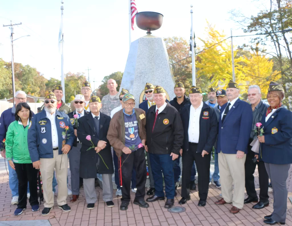 (Photo: Village of Islandia) Islandia Village Mayor Allan M. Dorman (front row, center) is joined by members of the Col. Francis S. Midura Veterans of Foreign Wars Post #12144, village board members and local residents during the Village’s Veterans Day ceremony on November 4.