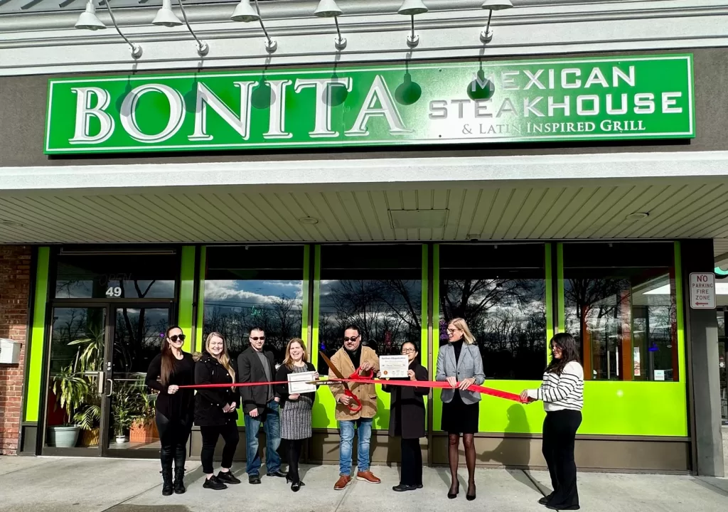 (Photo: Town of Brookhaven) Brookhaven Town Councilwoman Jane Bonner(second from right) celebrated the grand opening of Bonita  Mexican Steakhouse, in Rocky Point on January 11 with the owners Steve Salazar (with scissors) and Mariella Salazar (third from right.)