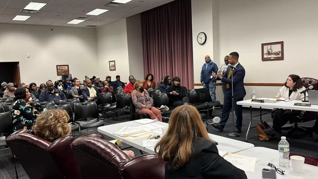 (Photo: Office of Legislator Carrié Solages) Nassau County Legislator Carrié Solages expresses his support of the community members' demands that the Elmont Memorial Library will be reinstated as an early voting site.