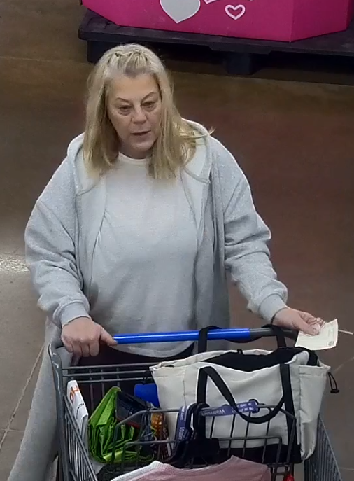 (Photo Courtesy of SCPD) This woman was caught on camera stealing merchandise from a Walmart in Commack last month.
