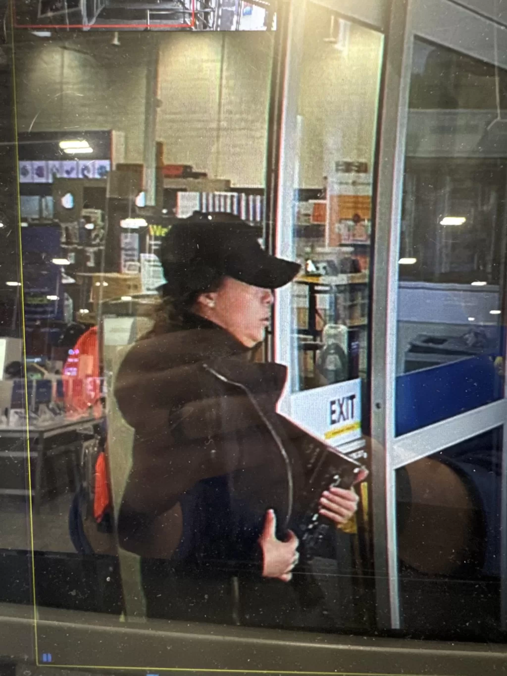 (Photo Courtesy of SCPD) This person used a stolen credit card to buy merchandise at a Best Buy store in Setauket.