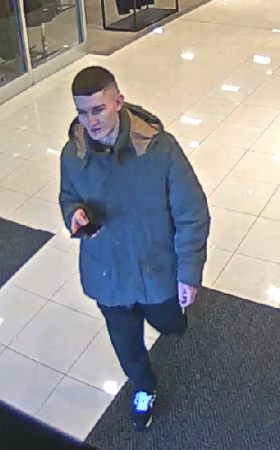 (Photo Courtesy of SCPD) This man is wanted for stealing merchandise from a Macy's store in Lake Grove.