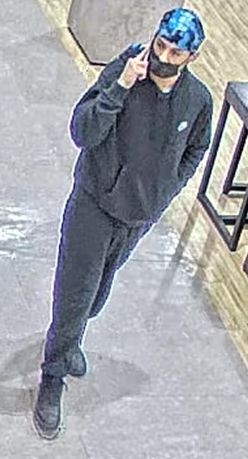 (Photo Courtesy of SCPD) This man was seen leaving Dick's Sporting Goods in Lake Grove on February 10 with $490 worth of merchandise.