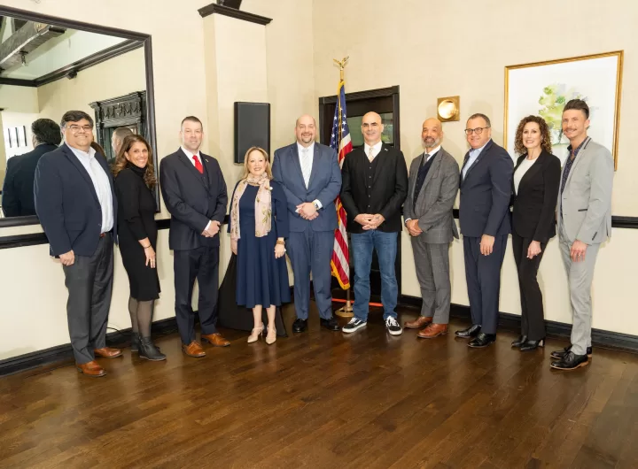 (Photo Courtesy of Long Island Board of Realtors) Nassau County Legislators Seth Koslow (fifth from left) and Scott Davis (fourth from right) are joined by members of the Long Island Board of Realtors (LIBOR) at LIBOR's “New Faces of the Nassau & Suffolk County Legislatures” breakfast forum on February 16. 