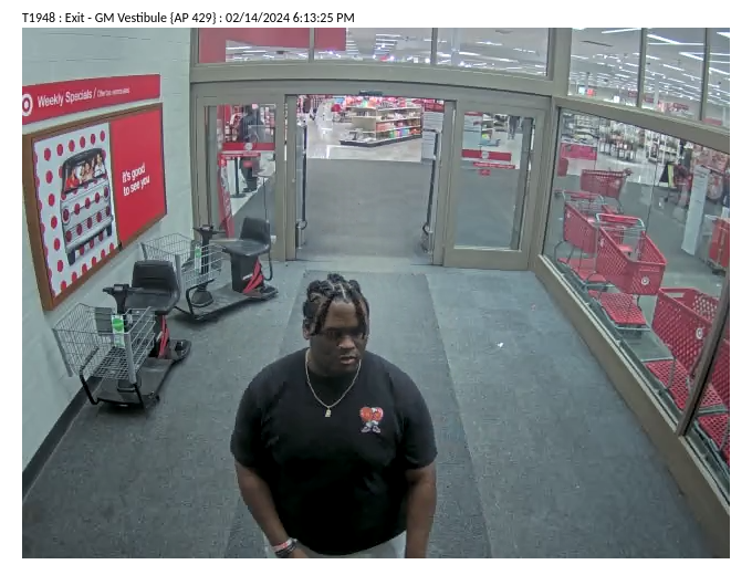 (Photo Courtesy of SCPD) Surveillance cameras show one of the suspects who stole over $500 in merchandise from a Target store in Medford.