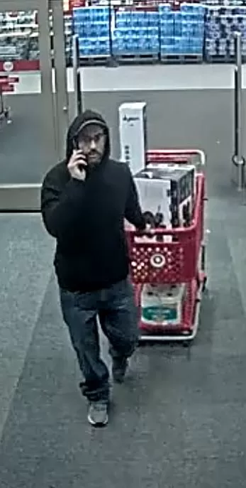 (Photo Courtesy of SCPD) This man is wanted for stealing $999 in merchandise from a Target store in Medford.