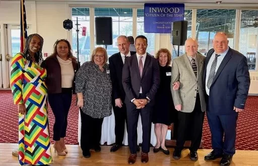 (Photo: Office of Legislator Carrié Solages) Nassau County Legislator Carrié Solages (fourth from right) poses with Hempstead Town Councilwoman Melissa "Missy" Miller (third from left) and the Inwood Civic Association after being named Citizen of the Year, along with Miller.