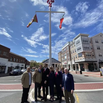 (Photos courtesy of the Office of Assemblymember Charles Lavine) Pictured (l-r) Assemblymember Lavine; Deputy Mayor, Donna McNaughton; City Councilwoman Marsha Silverman; Mayor Pamela Panzenbeck; Josh Mirsky with his father; & Councilman John Zozzaro at flag raising in Glen Cove on April 25.