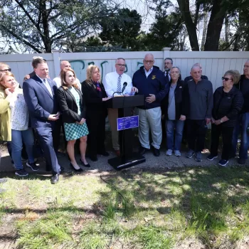 (Photo: Town of Hempstead) Hempstead Town Supervisor Don Clavin (standing behind podium) held a press conference on April 15 to denounce a bias incident that occurred in East Meadow earlier in the day.