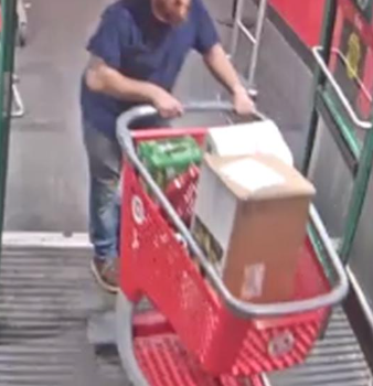 (Photo Courtesy of SCPD) This man is wanted for stealing from a Target store in Setauket.