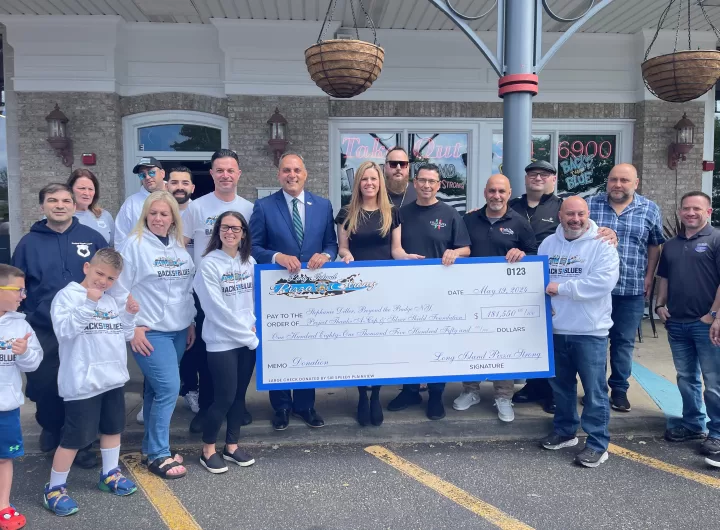 (Photo: Town of Oyster Bay) Oyster Bay Town Supervisor Joseph Saladino joins Long Island Pizza Strong Founders Anthony Laurino, Alyssa Guidice and Jim Serpico to present more than $180,000 to the widow of fallen NYPD Detective Jonathan Diller, as well as charities Beyond the Badge NY, Project Thank a Cop, and the Silver Shield Foundation.