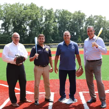 Plainview, NY – Oyster Bay Town Supervisor Joseph Saladino, Councilman Lou Imbroto, Town Clerk Richard LaMarca and Tax Receiver Jeffrey Pravato announce the competition of baseball field improvements at Haypath Park in Plainview. The Town of Oyster Bay upgraded the natural surface infield to a synthetic turf playing area.