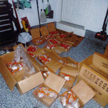 (Photo Courtesy of SCPD) Police found guns and illegal fireworks at the Smithtown home of Christopher Giancola.