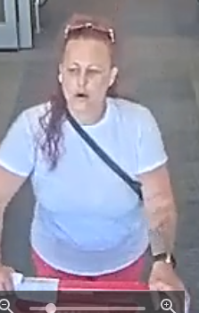 (Photo Courtesy of SCPD) This woman is wanted for stealing a vacuum from a Target store in Medford o June 25.