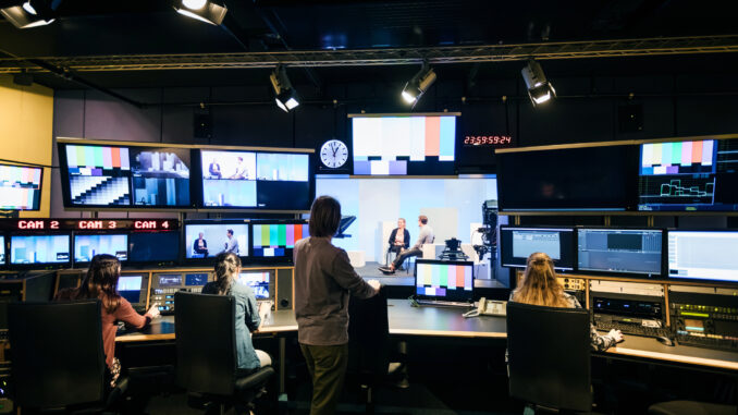 Group Of Students Working In TV Studio