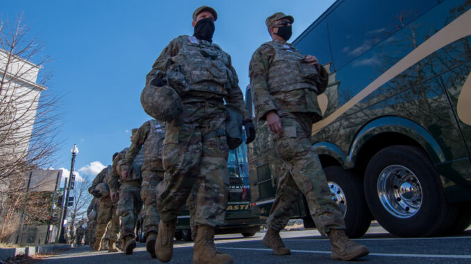 Armed National Guardsmen on security detail at the U.S. Capitol