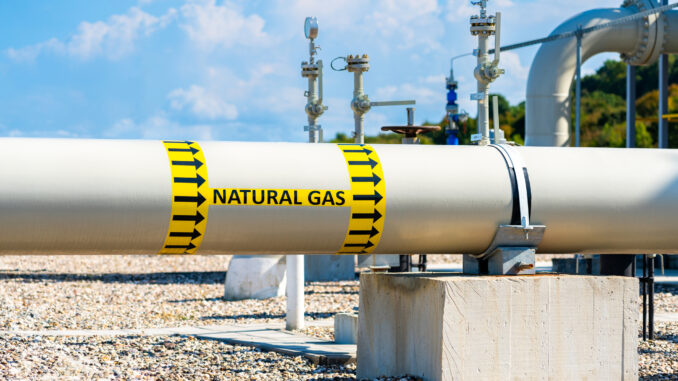 Natural gas pipeline with high pressure on compressor station. Concept of energy transportation infrastructure